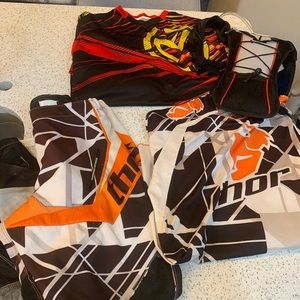 Racing outfits 2 tops large 1 pair of pants 32 and camel pack backpack